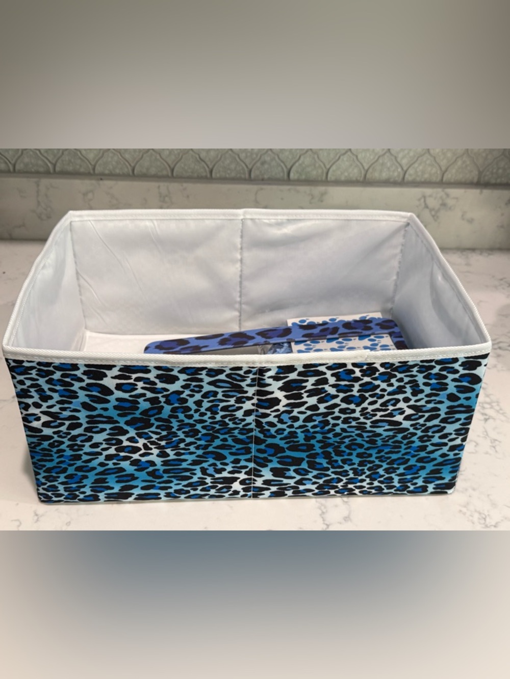Blue Leopard Print Storage Bin with car accessories